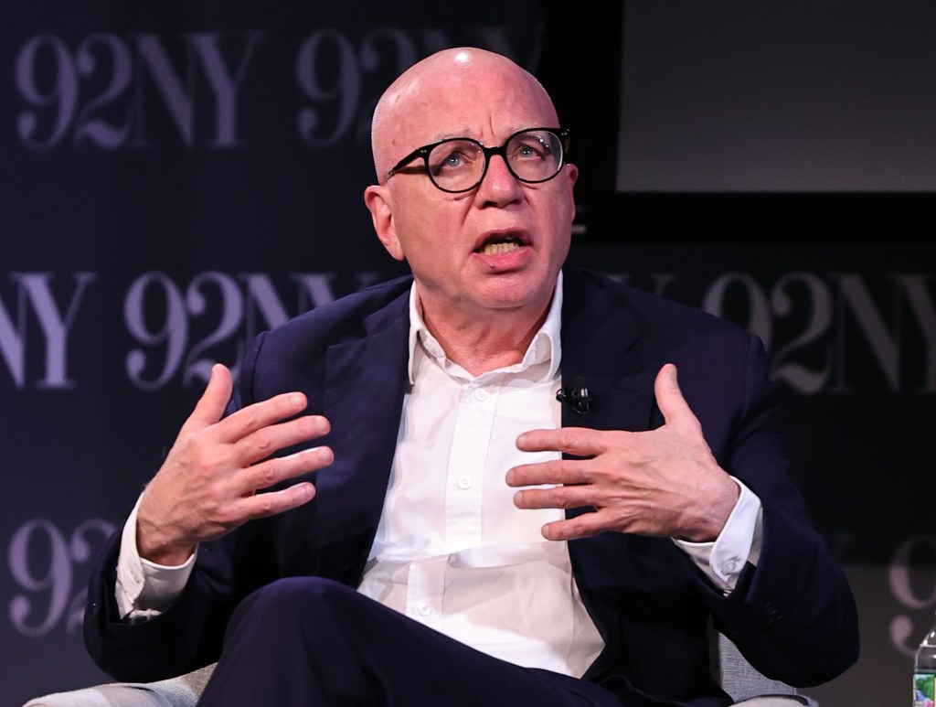 Michael Wolff speaking with hands gesturing.