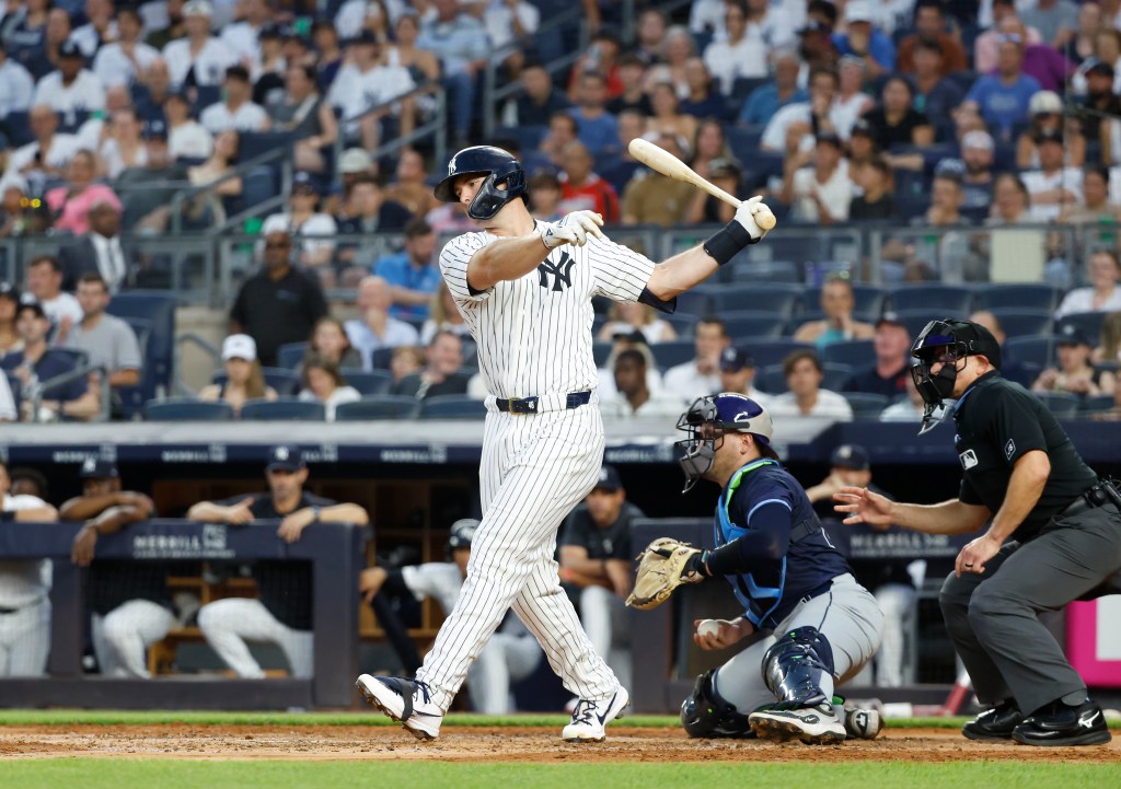 New York Yankees first base Paul Goldschmidt striking out swinging during a baseball game.