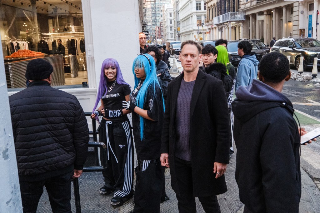 North West and friends are flanked by private security while shopping in NYC. 
