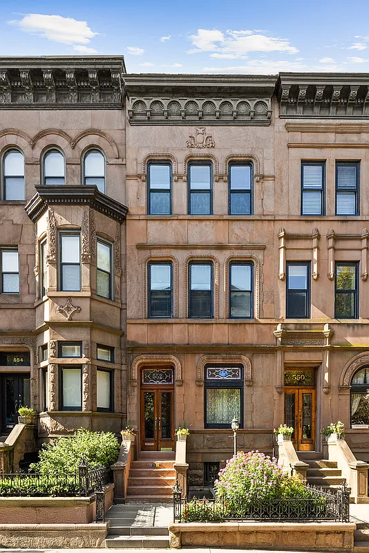 brownstone with stoop, decorative cornice