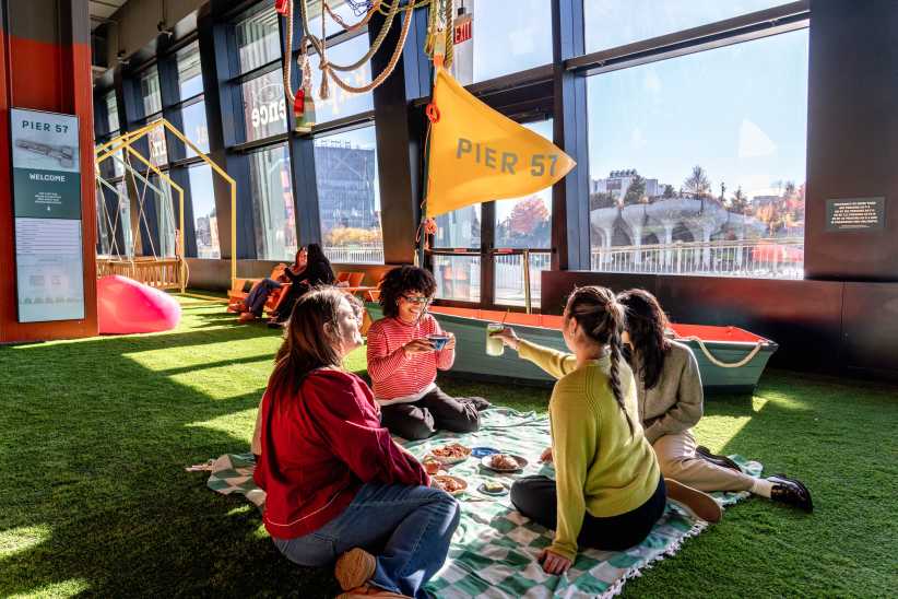 Moms having a picnic at the indoor playground at NYC's Pier 57