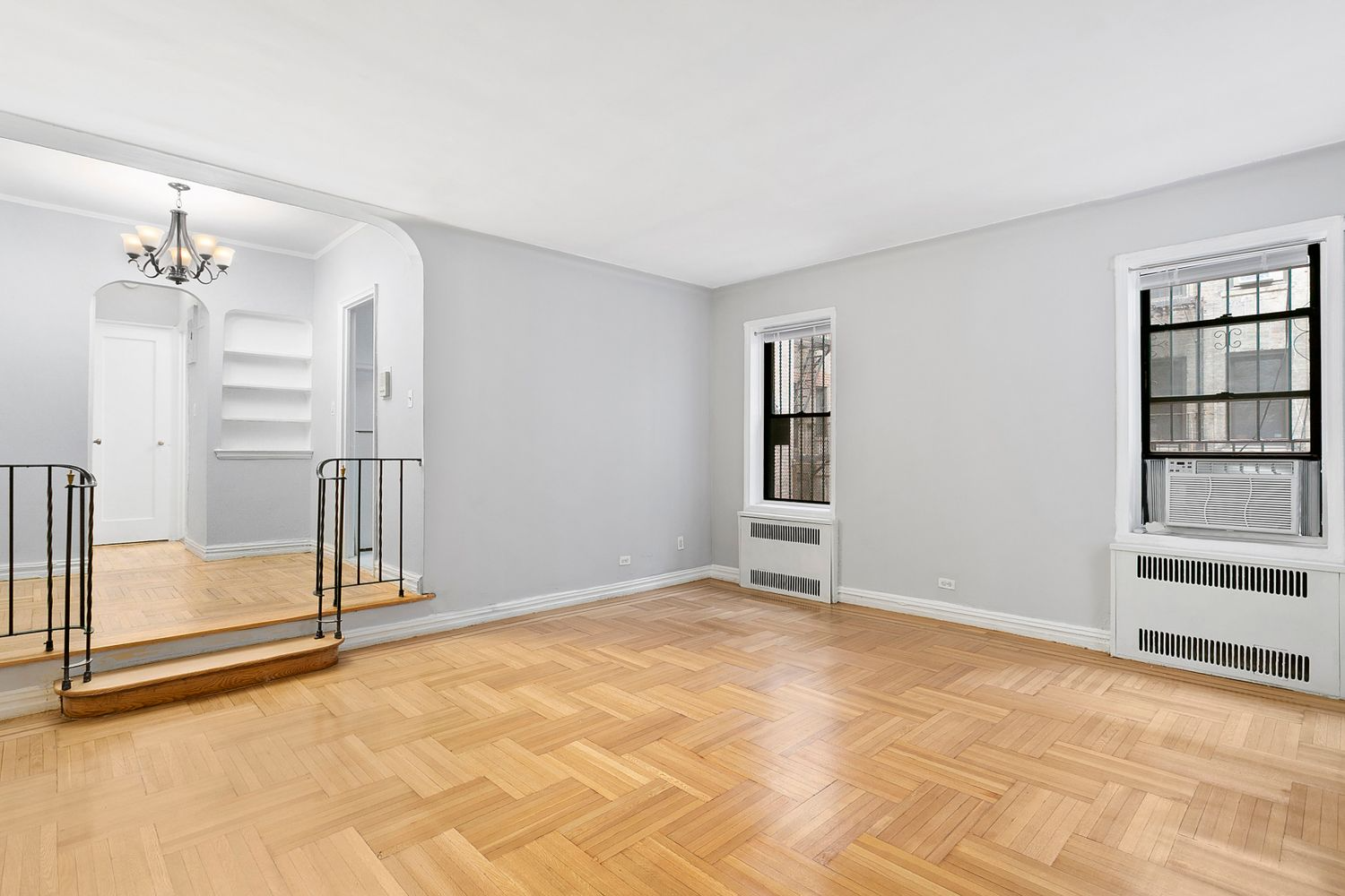 sunken living room with sunken living room, wood floors
