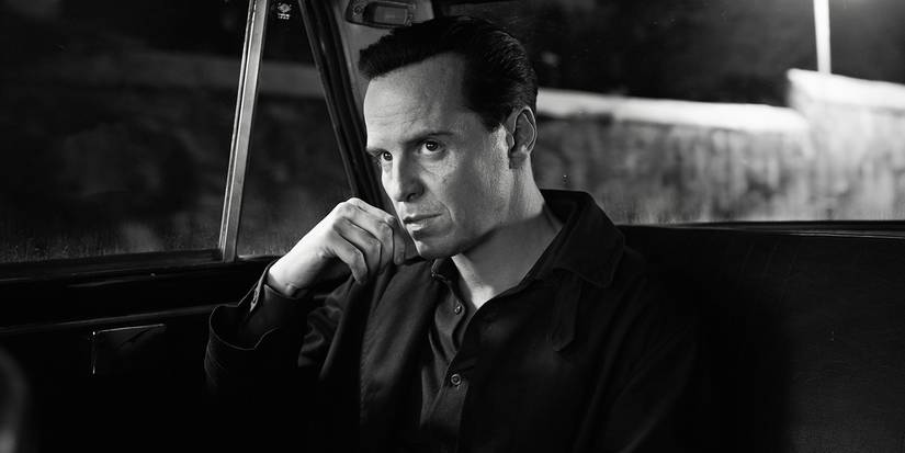 Andrew Scott as Tom Ripley sitting in a car in Netflix's Ripley