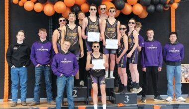 Trojans Post More Wins at Manhattan Tourney