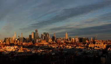 JERSEY CITY, NJ - DECEMBER 21: The sun sets on the skyline of midtown Manhattan and the Empire State Building on the winter solstice in New York City on December 21, 2025, as seen from Jersey City, New Jersey.