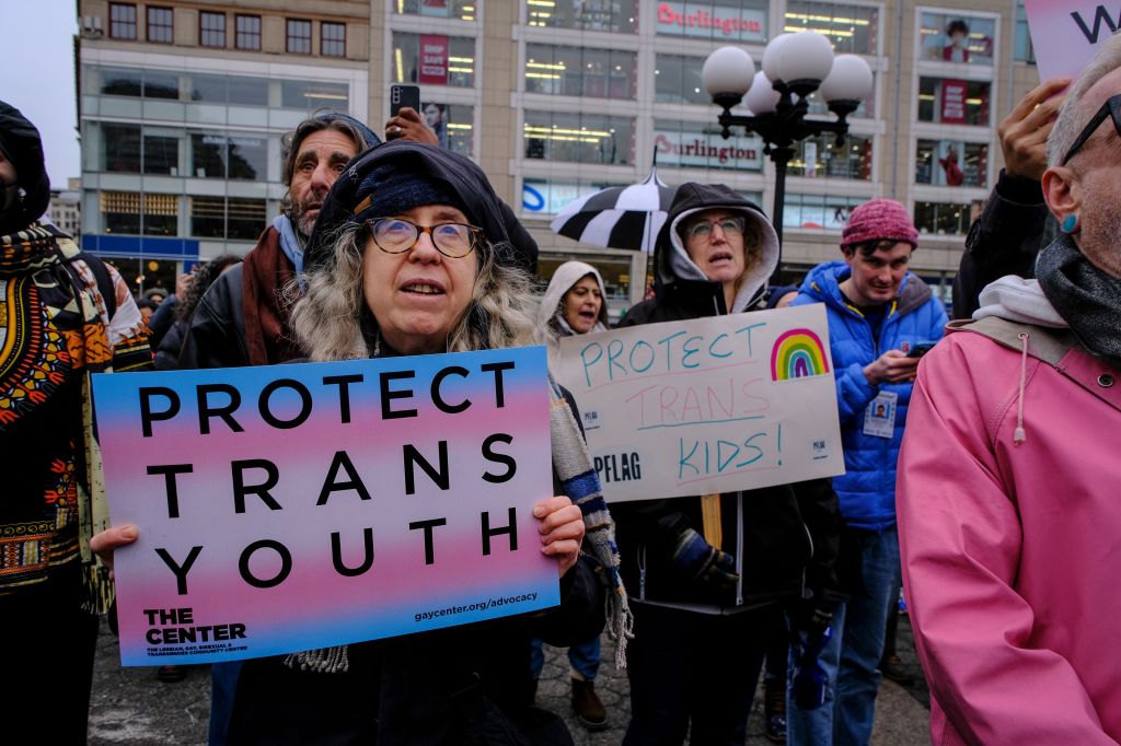 People rally in Union Square to advocate for transgender rights.