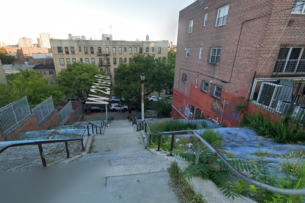 A street view from the top of a long outdoor staircase in The Bronx, with a street sign for "W 231st St" visible below.