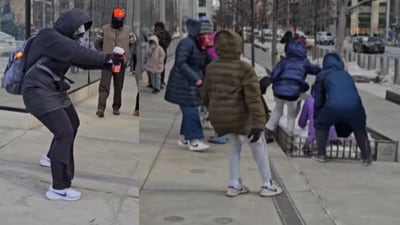 A man filmed pedestrians battling strong winds in New York City. (Instagram/cjjones1841)