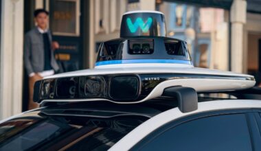 A close up of the rooftop of a Waymo robotaxi that shows sensors.
