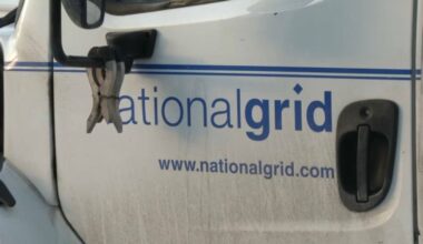 driver's side door of national grid truck