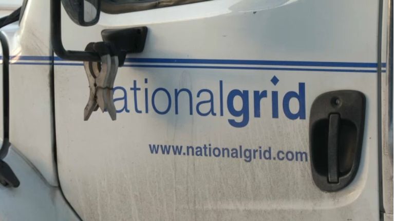 driver's side door of national grid truck