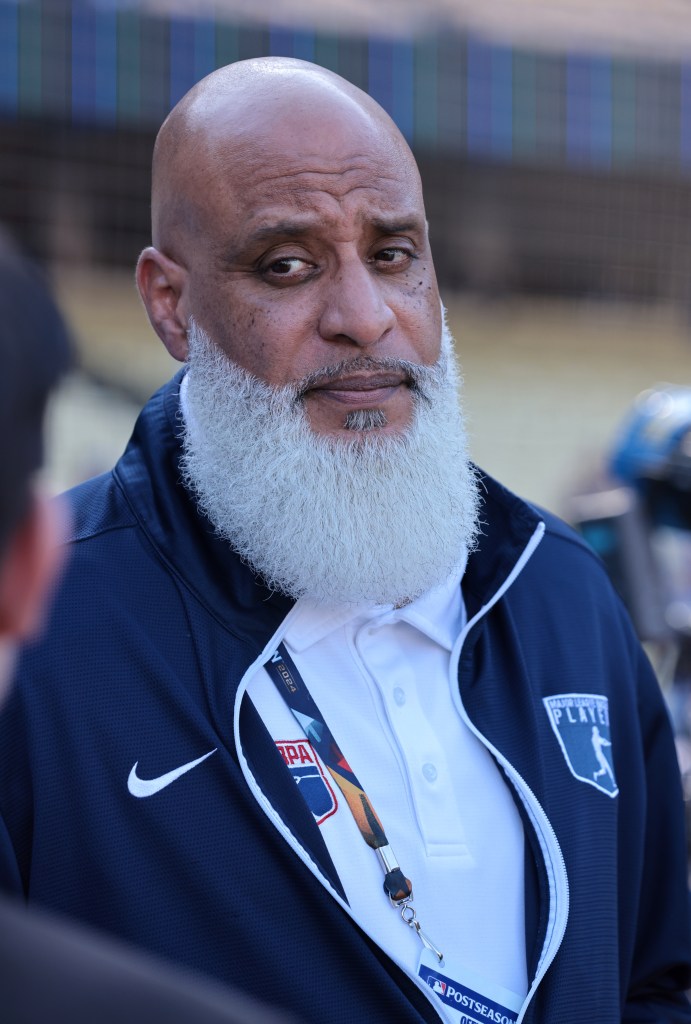 Baseball Players Association director Tony Clark on the field before World Series Game 1.