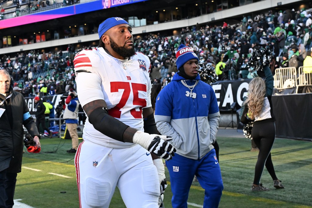 Giants guard Joshua Ezeudu (75) leaves the field after the Philadelphia Eagles 20-13 win over the Giants in Philadelphia. 