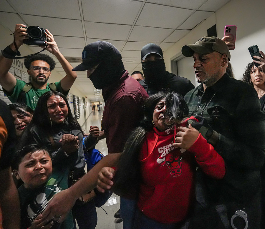 Dean Moses of amNewYork captured this image in August 2025 of a family separation by ICE agents at 26 Federal Plaza in Lower Manhattan. It was part of his year-long coverage of immigration enforcement at the facility, and its impact on families.