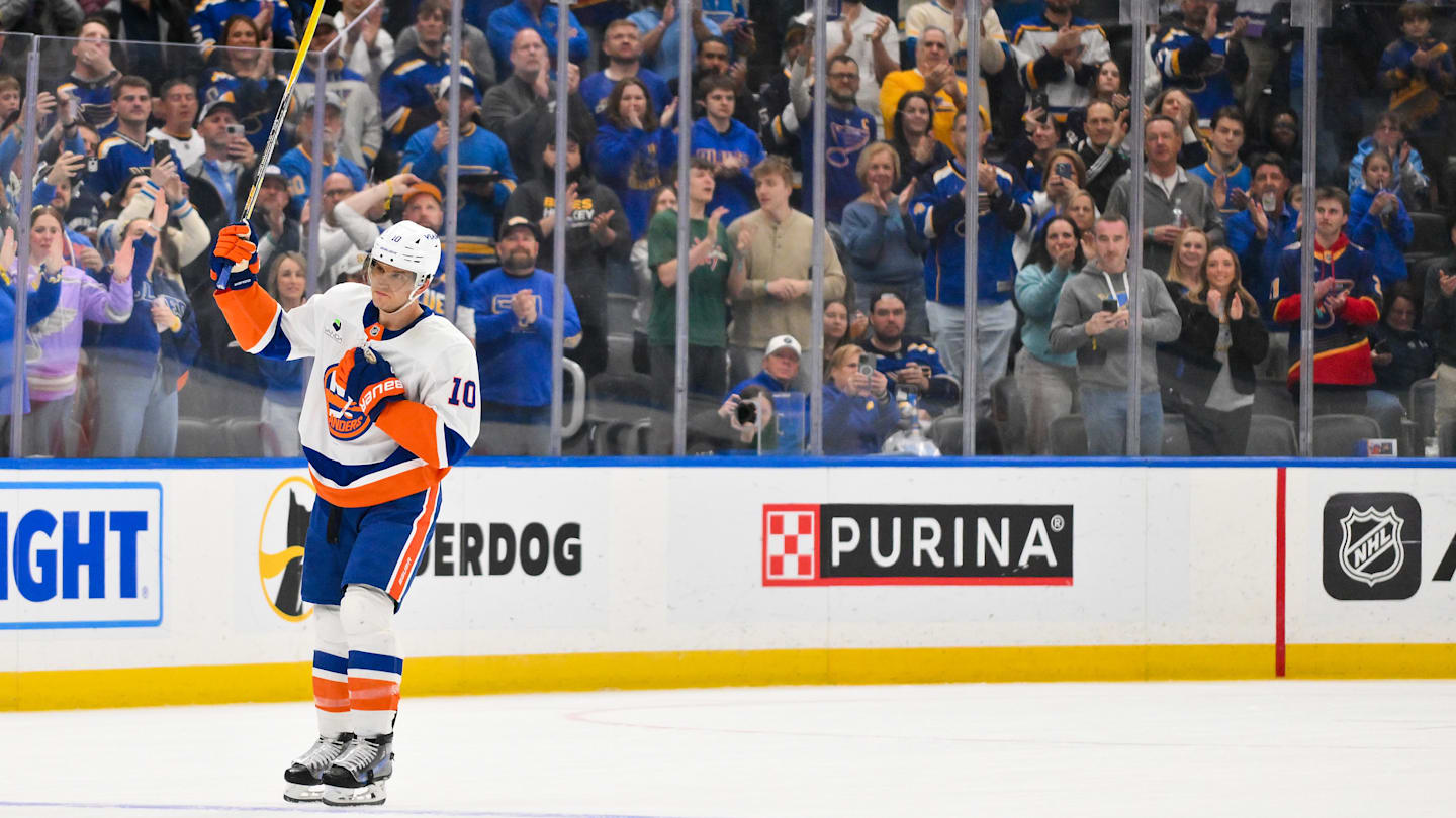 Mar 10, 2026; St. Louis, Missouri, USA; Former St. Louis Blues and current New York Islanders center Brayden Schenn (10) salutes the fans as he receives a standing ovation during the first period at Enterprise Center.   Mandatory Credit: Jeff Curry-Imagn Images