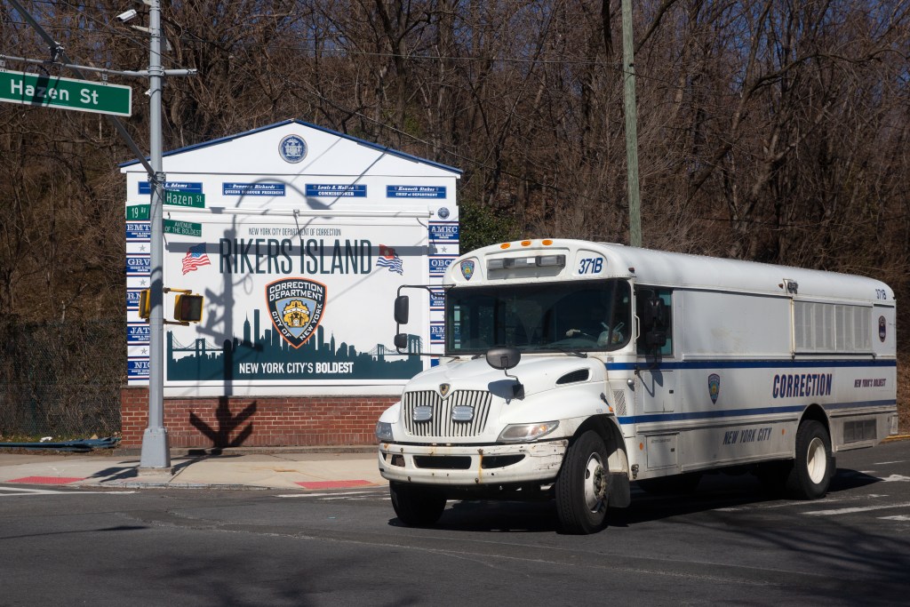A Department of Correction bus leaves Rikers Island, Feb. 28, 2022.