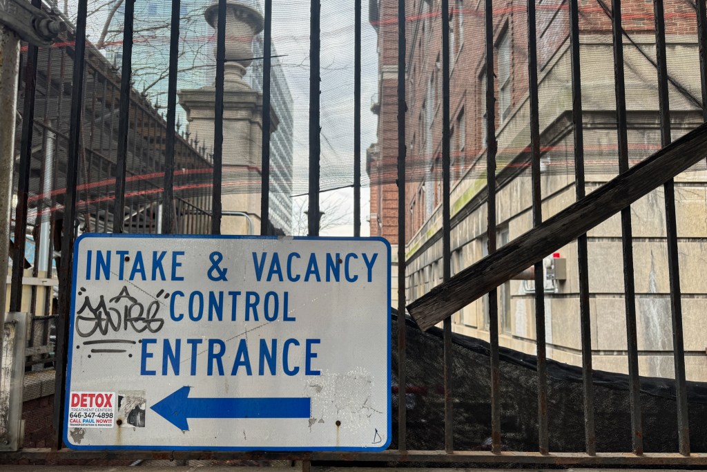 The 30th Street Men’s Shelter was housed in a crumbling brick building surrounding by scaffolding.