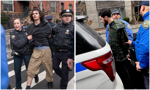 Two suspects are arrested after a device was thrown at a rally organized by right-wing activist Jake Lang near Gracie Mansion on Saturday.