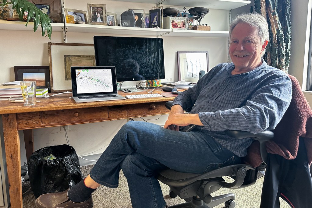 NYU professor Claude Desplan poses for a portrait in his office.
