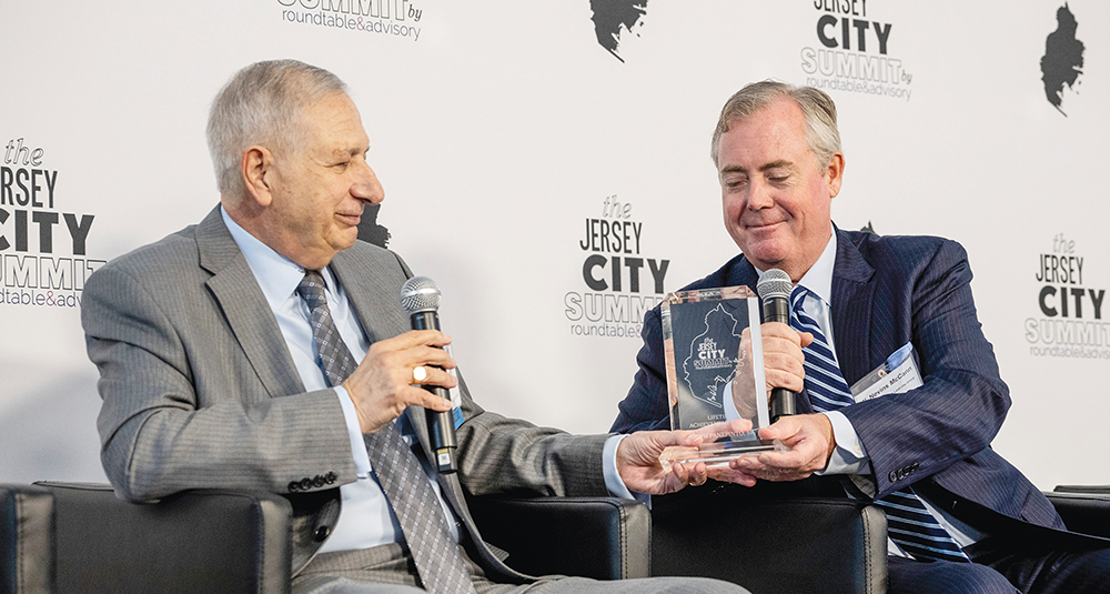 Panepinto Properties founder Joseph Panepinto Sr. was awarded a Lifetime Achievement Award at the 9th Annual Jersey City Summit May 29. The industry event drew nearly 1,500 attendees with appearances from New Jersey Gov. Phil Murphy and Jersey City Mayor Steven Fulop as well as industry leaders. The Lifetime Achievement Award recognized Panepinto's nearly 50 years of transformative development and philanthropic contributions to Jersey City. From left: Panepinto and Connell Foley LLP partner W. Nevins McCann also participated in a fireside chat along with the award ceremony.