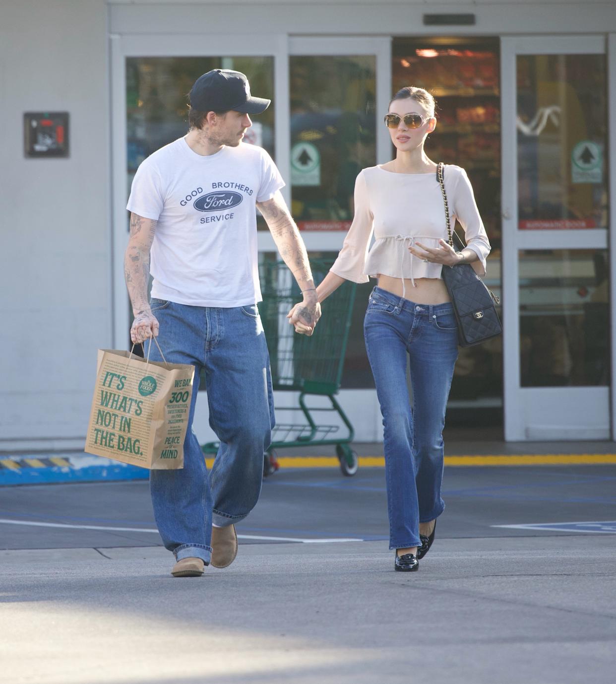 He claimed his parents were trying to ruin his marriage to the actress (seen above with Brooklyn leaving the grocery store.) BACKGRID