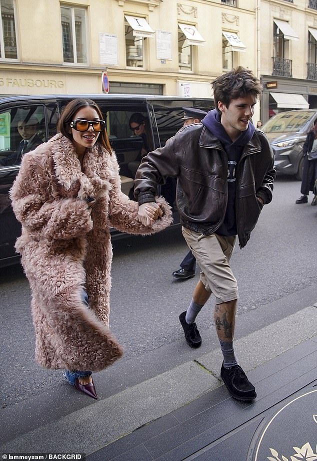 The couple couldn't wipe the smiles off their faces as they arrived at their lavish hotel by a private chauffeur