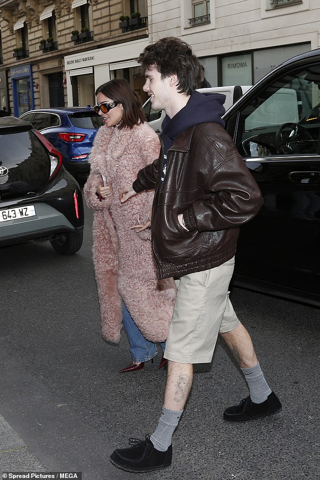 The couple held hands as they arrived at their hotel