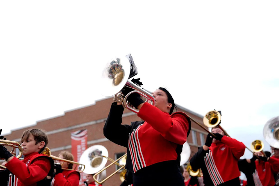 FILE - The Harlem High School marching band performs in the 36th annual Oliver Hardy Festival parade through downtown Harlem.