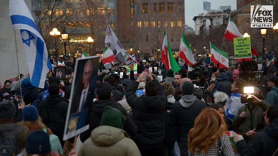 Pro-Khamenei and anti-Khamenei protesters clashing during a demonstration at Washington Square Park.