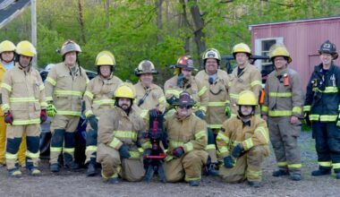 A group of Massena firefighters that had just completed a Vehicle Rescue: Operations Level state certification process with Municipal Fire Instructors Mulvenna and O