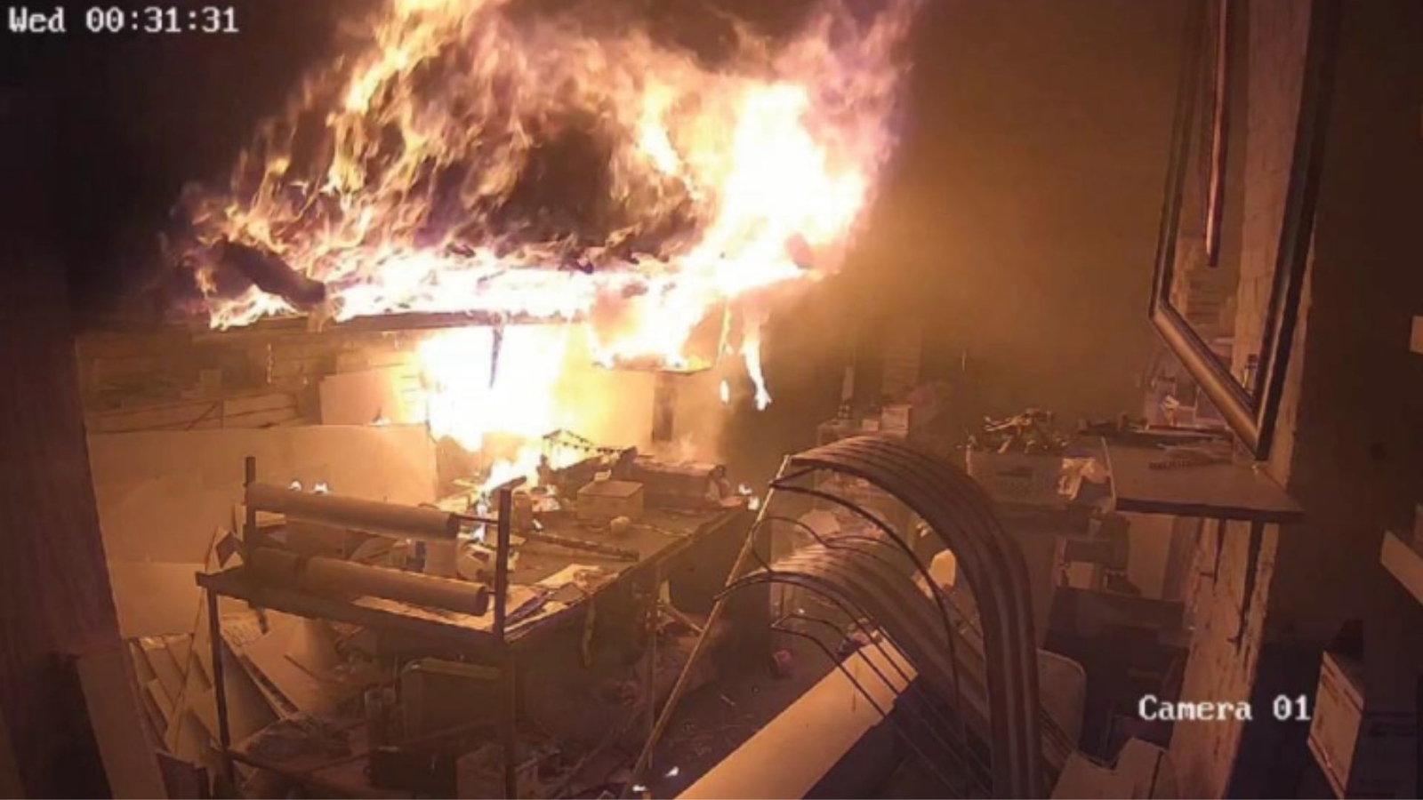 Queens arson: Video shows father, son burning down Richmond Hill building where they squatted print shop, prosecutors say