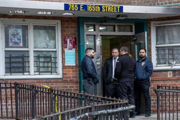 Police investigate after a man was fatally shot inside a Bronx apartment building on Friday morning.