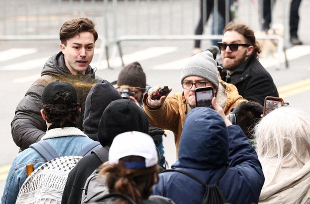 Supporters of far-right influencer Jake Lang (facing camera) use pepper spray (C) as they face counter-protesters during a protest organized by Lang against alleged "Islamification" in front of Gracie Mansion, New York Mayor Zohran Mamdani's official residence, in New York on Saturday, March 7, 2026. (Photo by CHARLY TRIBALLEAU / AFP via Getty Images)