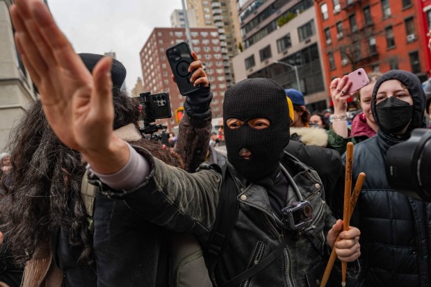 Activists demonstrate at a protest organized by the right-wing influencer Jake Lang on March 7, 2026 in New York City. (Photo by Ryan Murphy/Getty Images)