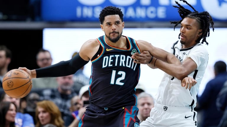 Detroit Pistons forward Tobias Harris (12) drives against Brooklyn Nets...