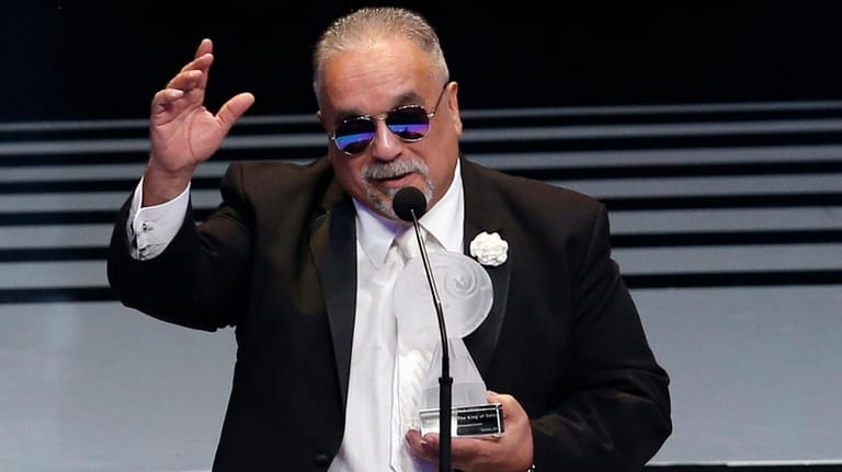 Willie Colon accepts the award for best musica afroamericana at...