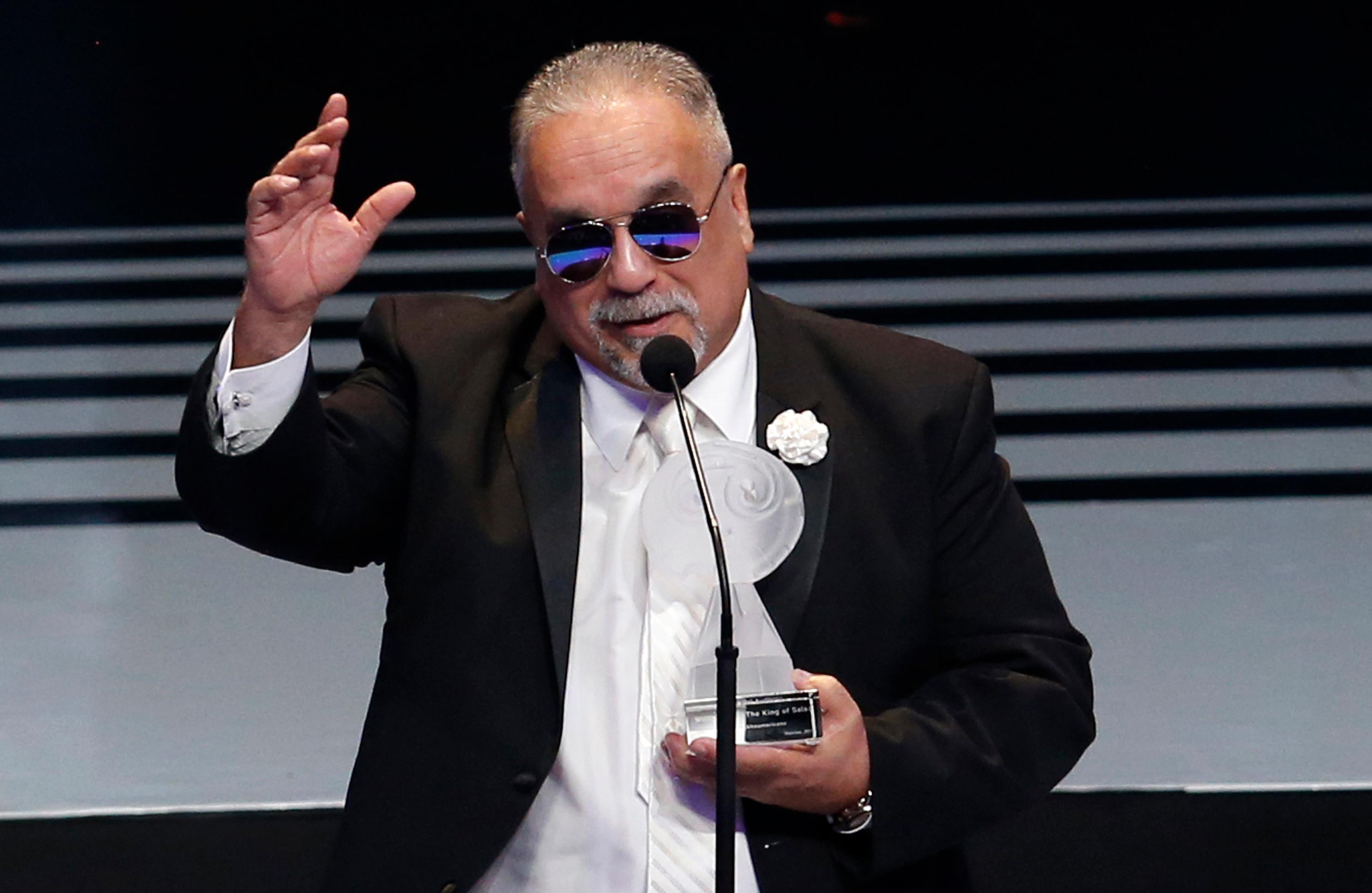 FILE – Willie Colon accepts the award for best musica...