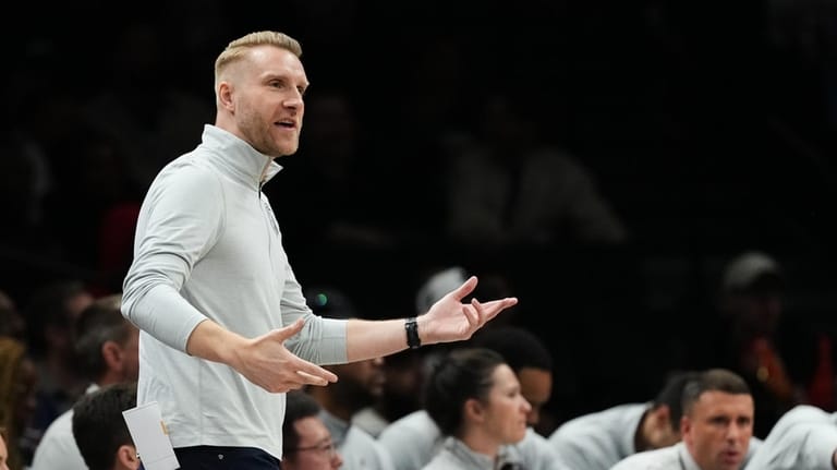 Memphis Grizzlies head coach Tuomas Iisalo reacts during the second...