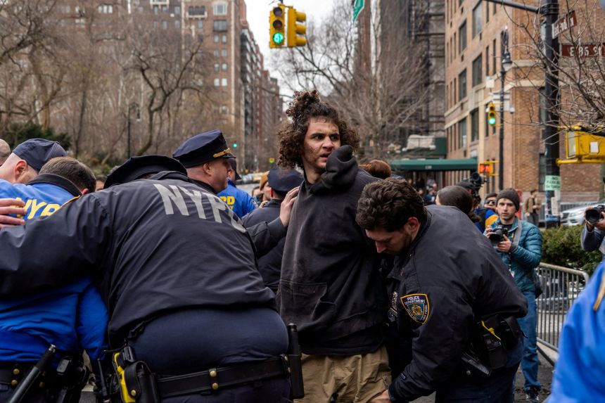 Emir Balat, a high school senior from Pennsylvania, is arrested outside Gracie Mansion on Saturday.