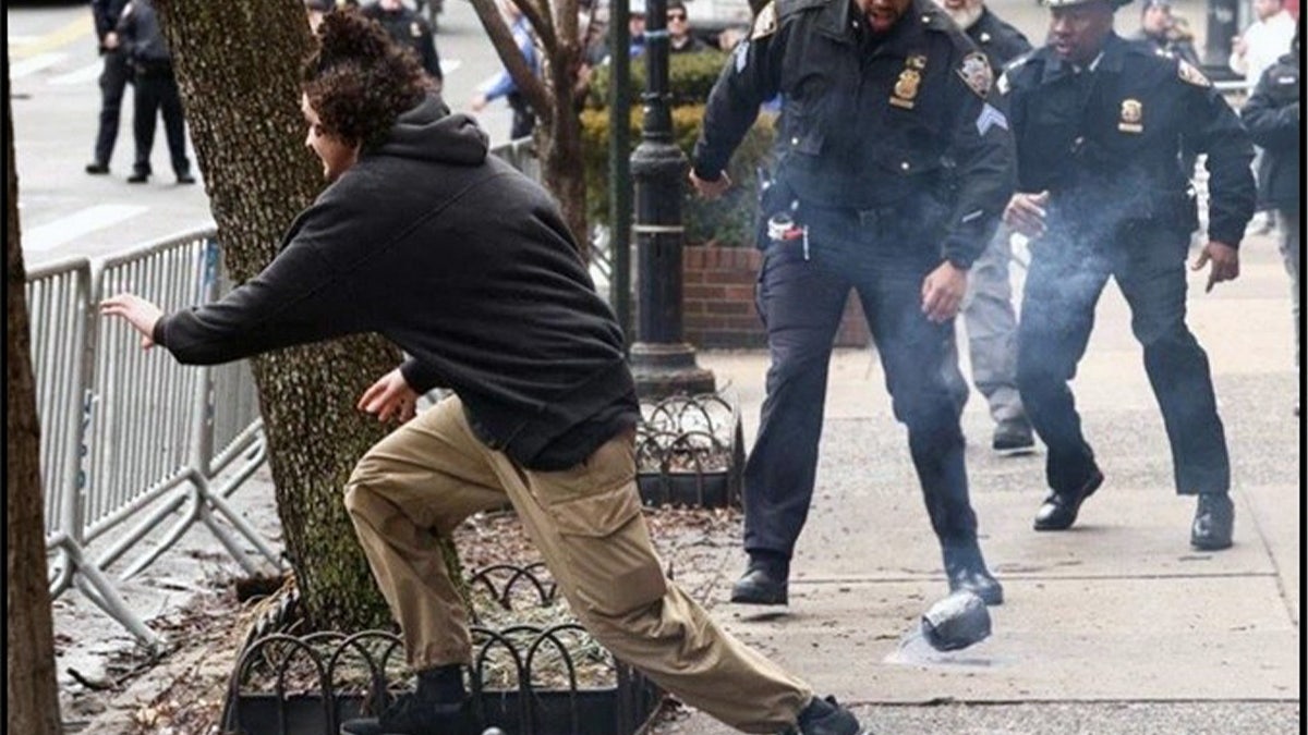 Suspect running away from Gracie Mansion in NYC.