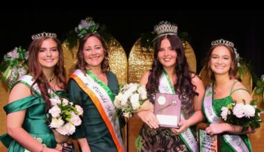 Tayler Riggie (third from left) is the 2026 Bay City St. Patrick's Day Parade Queen. 