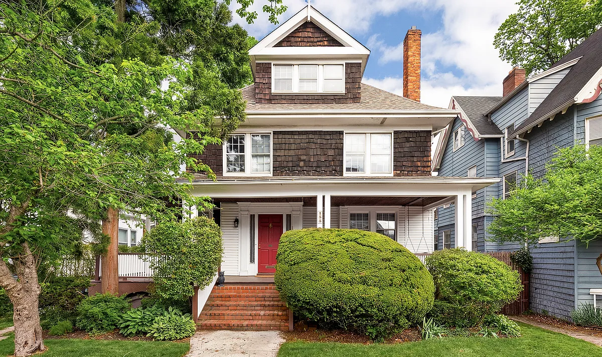 house with shingles, front porch