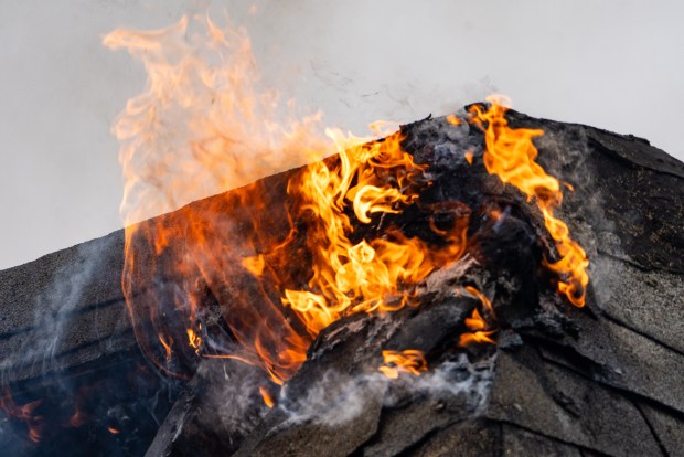 Three people were killed, including a child of unknown age, with several others suffering serious injuries, after a four-alarm fire broke out inside a two story residence at 44-49 College Point Boulevard in Queens on Monday March 16, 2026. 1309. (Theodore Parisienne / New York Daily News)