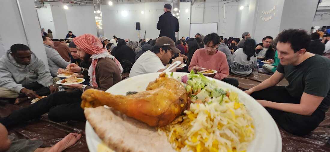 Families gather at the Islamic Center of New York City to pray and break the daily Ramadan fast. "You and I can be an iftar dinner together and you don’t have to share faith with me. We can just both sit and eat, said Imam Khalid Latif.