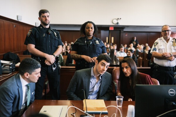 Luigi Mangione appears in Manhattan Criminal Court in New York, Dec. 8, 2025. (Stephen Yang/New York Post via AP, Pool, File