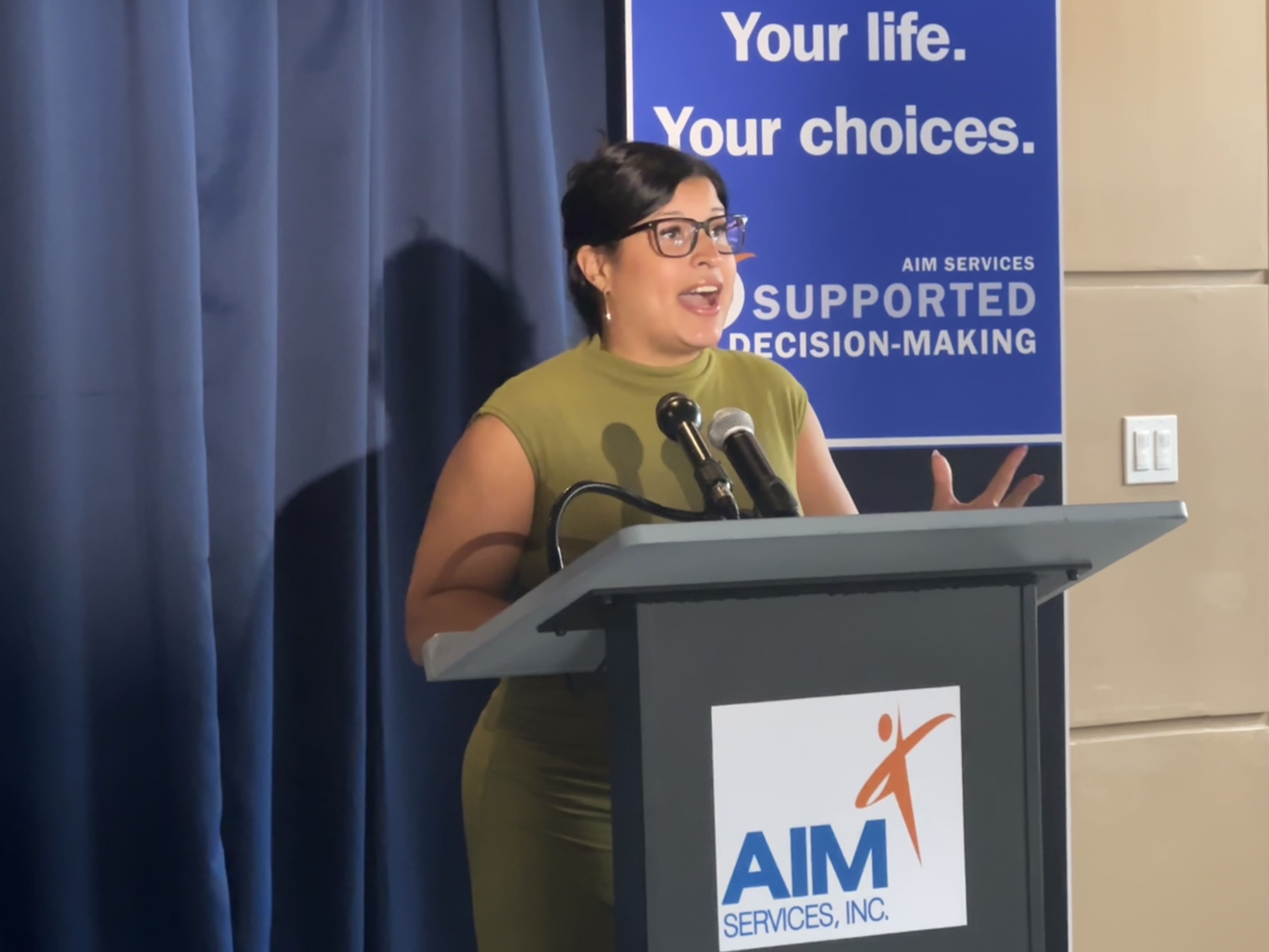 Chief of Program Implementation Alexis Harrington spoke at the announcement...