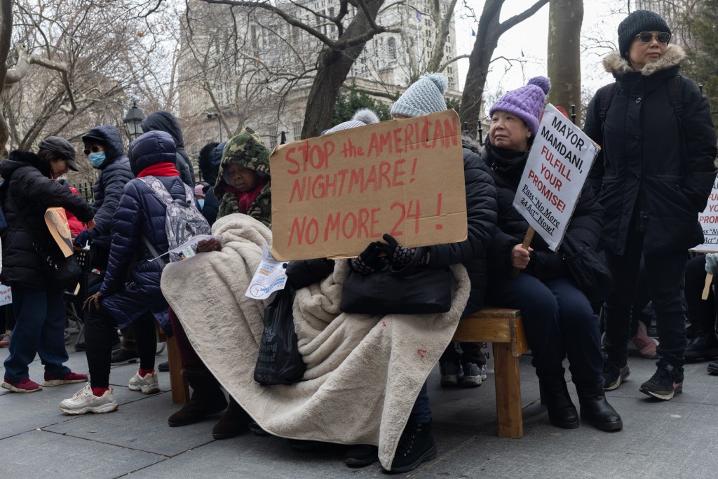 Home health aides being a sit-in outside City Hall to demand the passage of a bill ending 24-hour shifts,