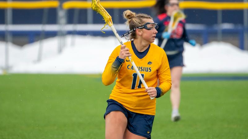 Women's Lacrosse Buries Manhattan for First Conference Win