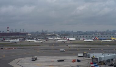 Pilot and copilot killed in collision between jet and fire truck at New York's LaGuardia Airport