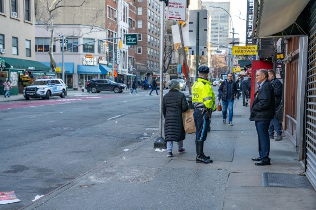 Police investigate after a hit-and-run driver fatally struck a 44-year-old man on E. 61st St. and Lexington Ave. Friday morning.